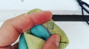 Upcycling-Kescher alte Socke Loch